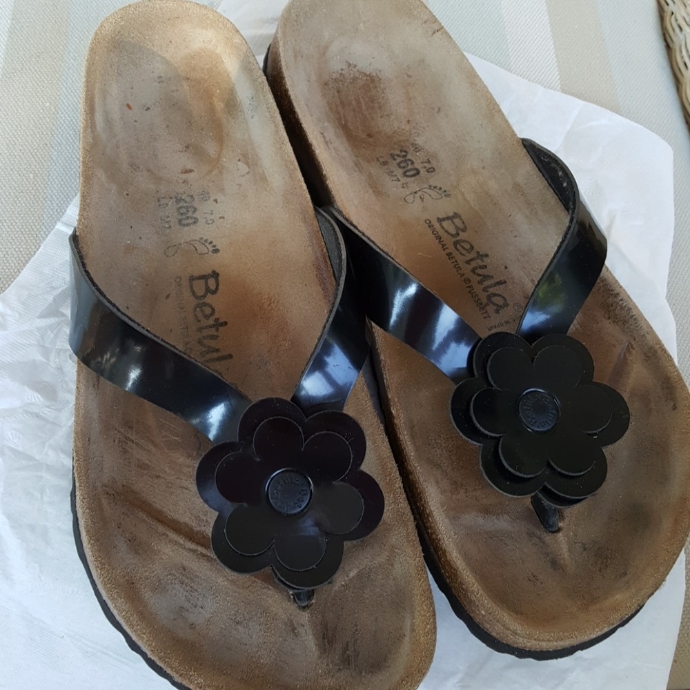 Adorable black patent Birkenstocks.